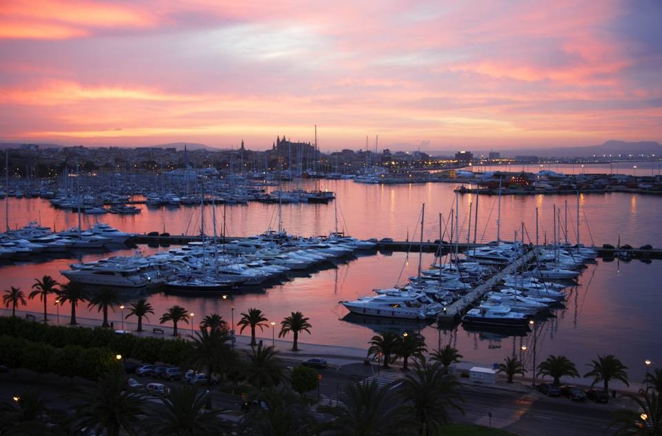 Yachts at sunrise docked in harbour at Palma de Mallorca